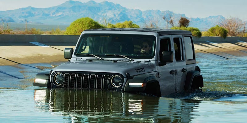 Grey 2026 Jeep Wrangler Showing it's capabilities